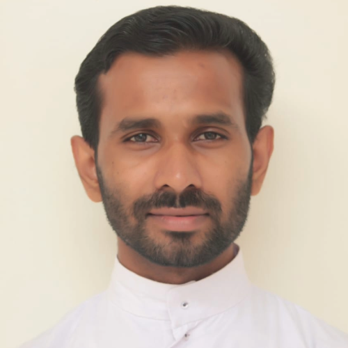 Fr. Dennies Kochuveetil CST